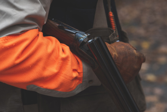 hunter close up with some blaze orange